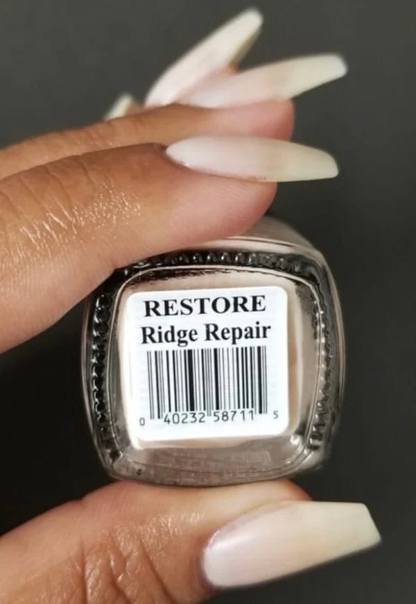 Drs Remedy Restore Ridge Repair nail polish shown on natural nails in neutral beige shade